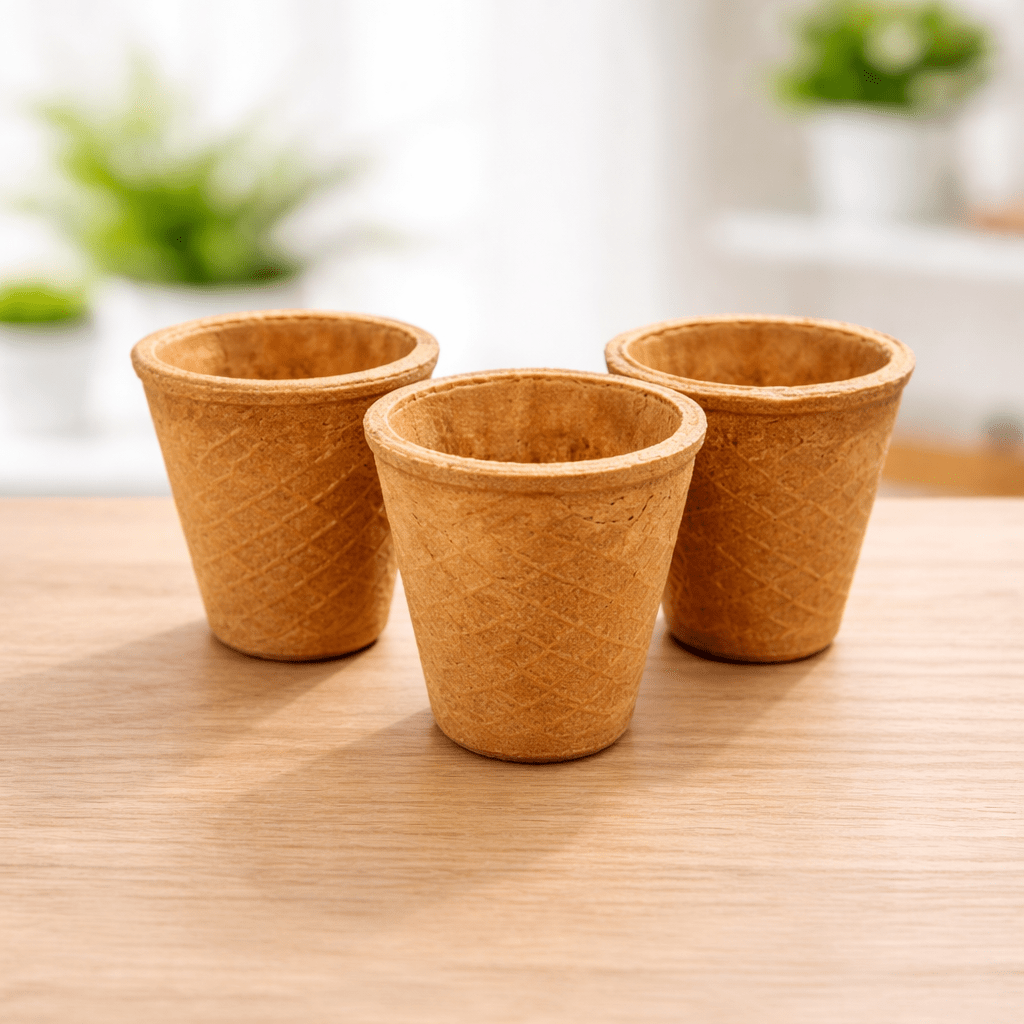 Edible wheat bran cups on wood